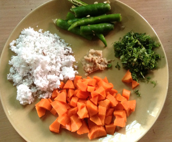ingredients for akki shavige - carrot, chili, ginger, coconut, coriander