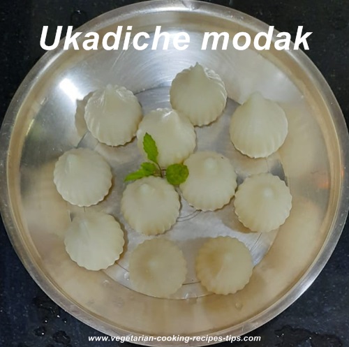 Ukadiche modak, steamed modak or sweet dumplings are made for the ganesh chaturthi festival. These modak are filled with coconut and jaggery or sugar stuffing and flavored with cardamom.